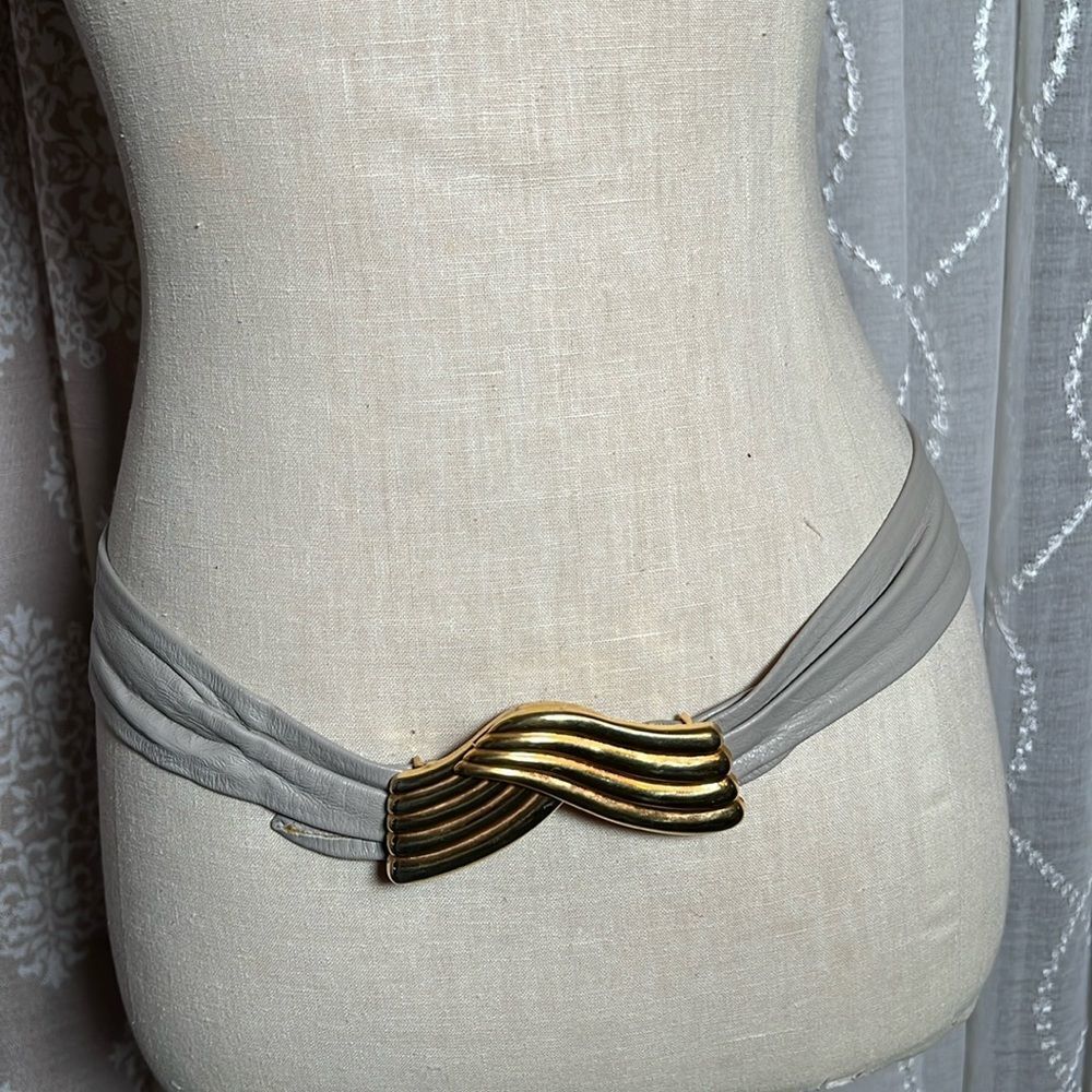 Vintage adjustable grey/taupe Belt with metal gold buckle.
